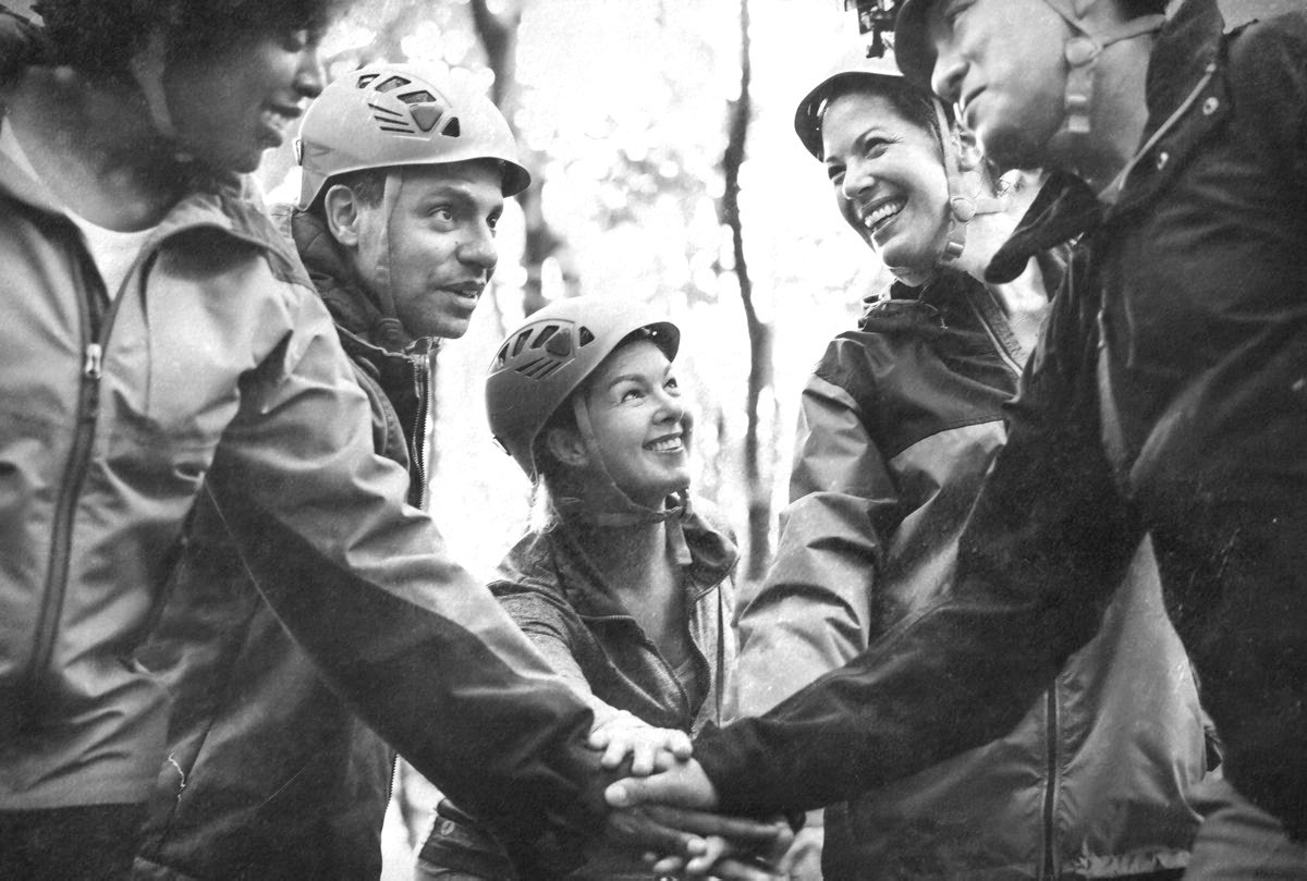 Volunteers holding hands